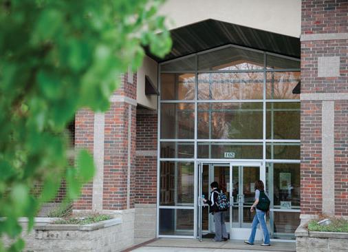 students walking into front door of Salem campus building